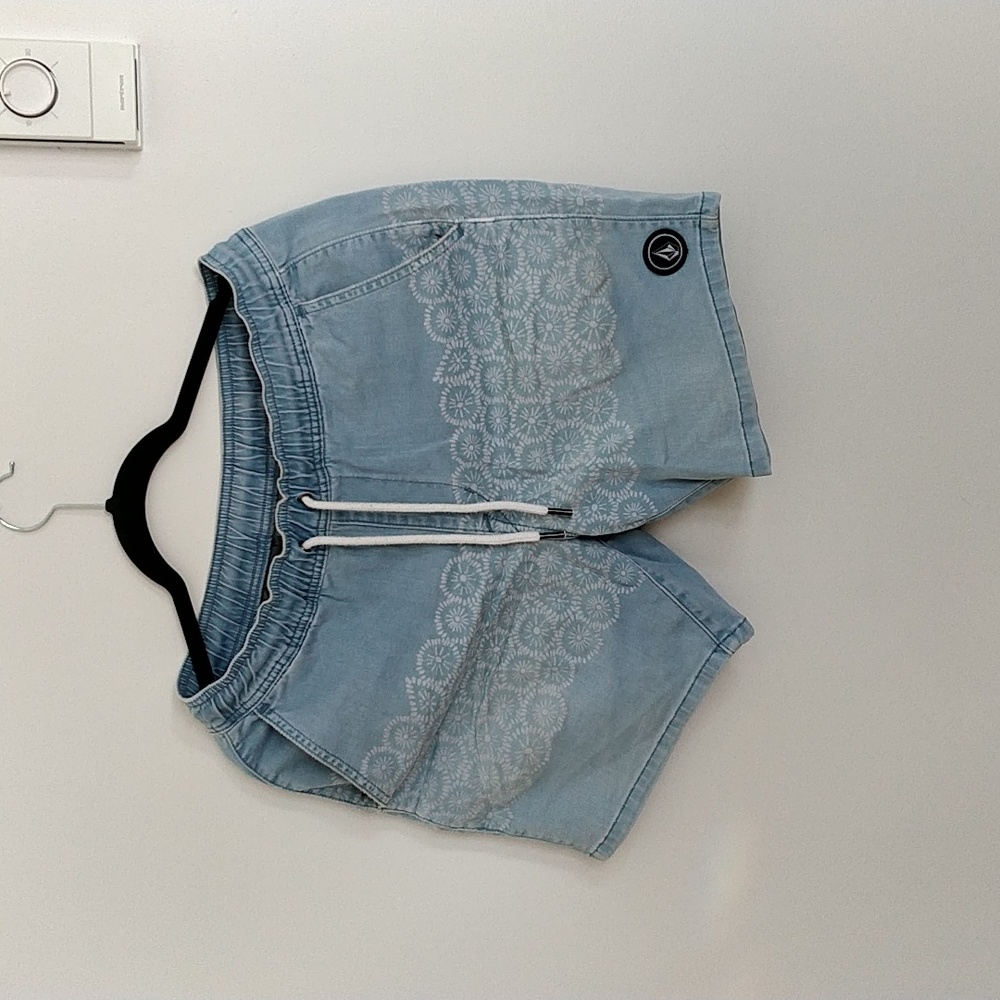 Volcom boardshorts, blue with white patterns.  In Small.